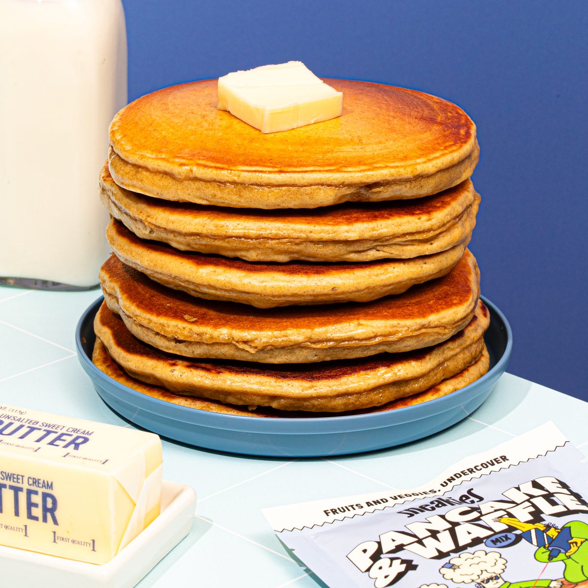Buttermilk Blast pancake stack with the Sneakies package, cauliflower and a banana